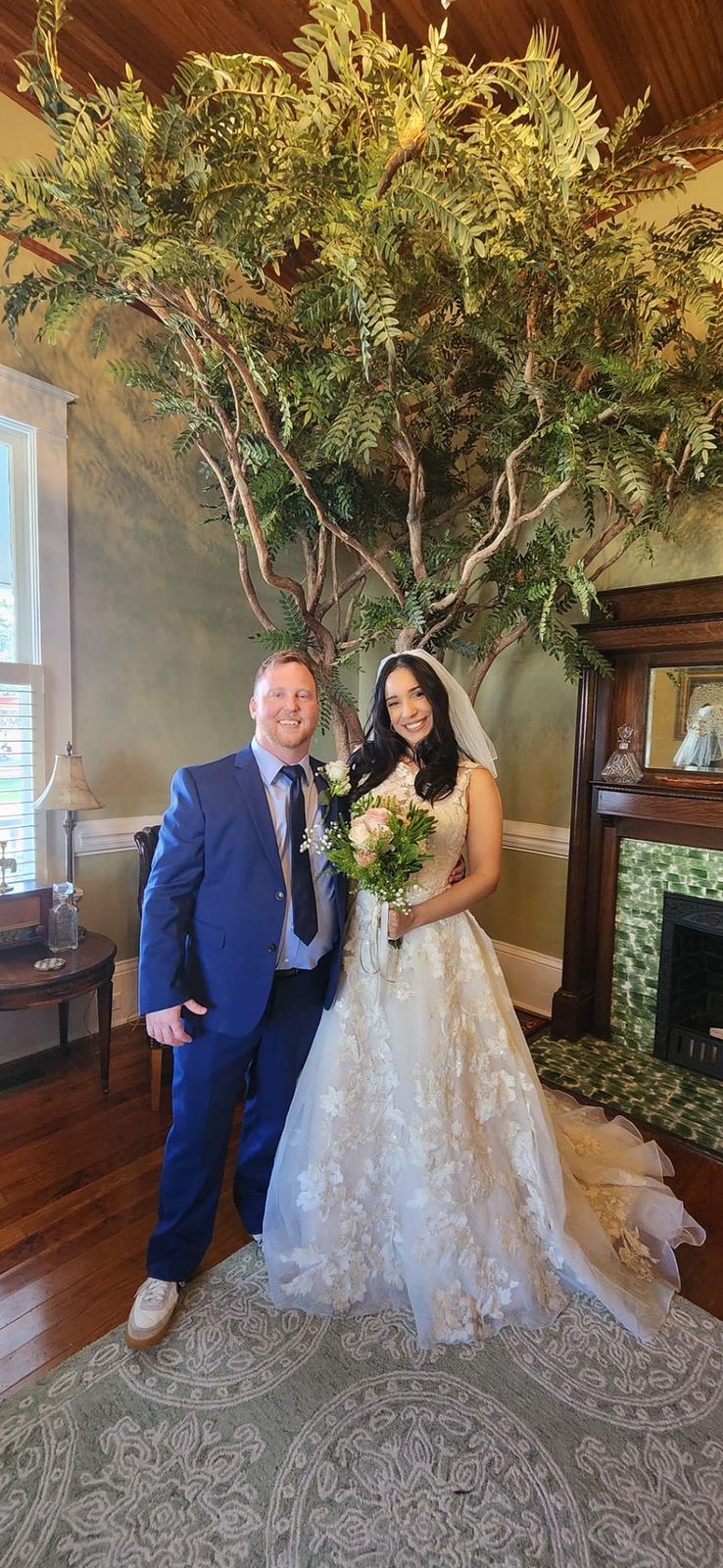 Customer David M. in the Medium Blue 2 Button Suit with his bride on their wedding day