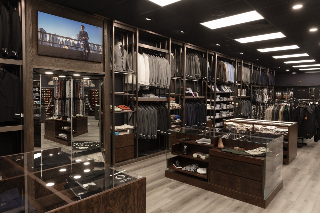 Suit displays and wood fixtures inside Giorgio Men’s Wear in Chattanooga